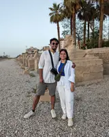 Akshat and Akanksha beside the avenue of sphinxes in Luxor, Egypt