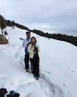 Akshat and Akanksha on a snow slope above Jibhi, Himachal Pradesh